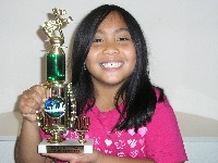 Girl holds trophy